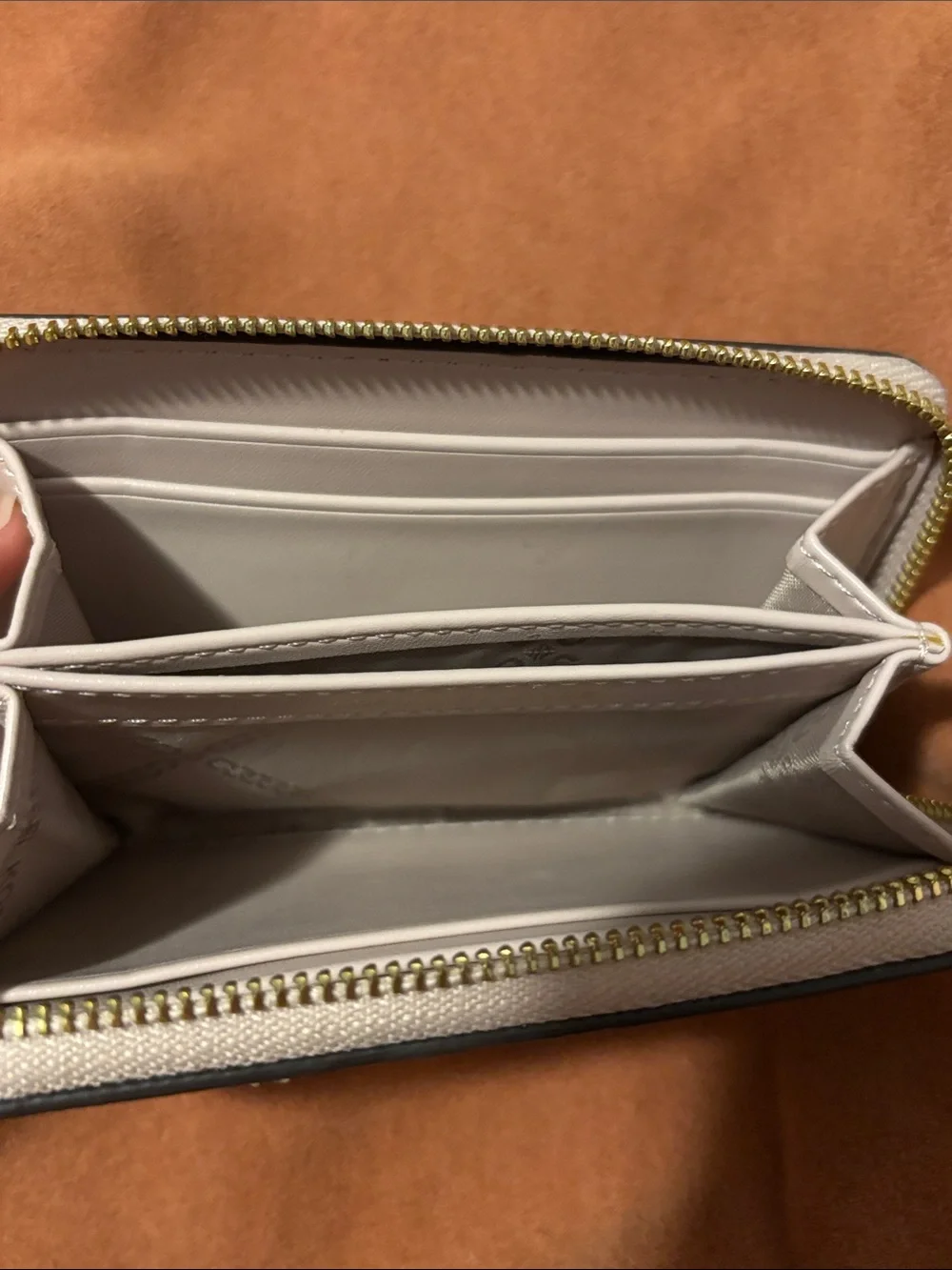 Michael Kors Pebble Leather Zip Card Case in Light Beige with Gold Hardware